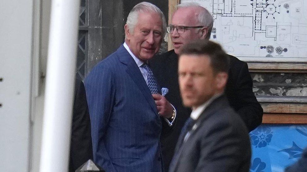 King Charles smiles as he leaves a Coronation rehearsal