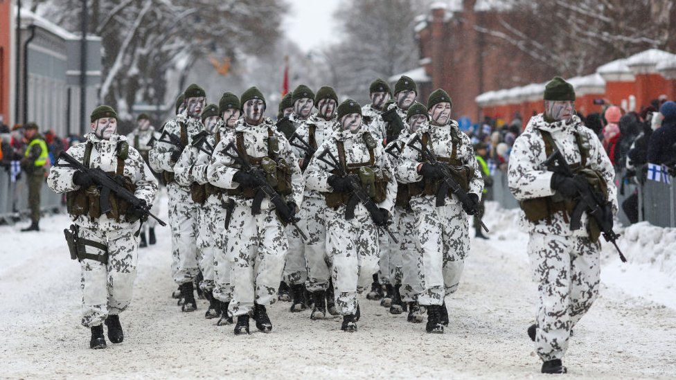 Soldiers of the Finnish Armed Forces are seen marching during the Independence Day parade in Hamina city