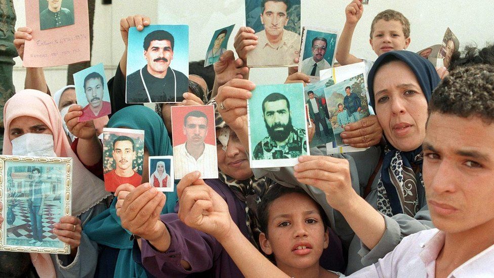 Families of missing victims of conflict in Algeria hold a weekly demonstration at the National Office of Human Rights 02 September at Addis Ababa Square, showing photos of their relatives who have disappeared in the continuing Algerian civil war