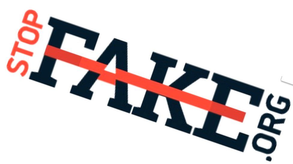 Stop Fake logo