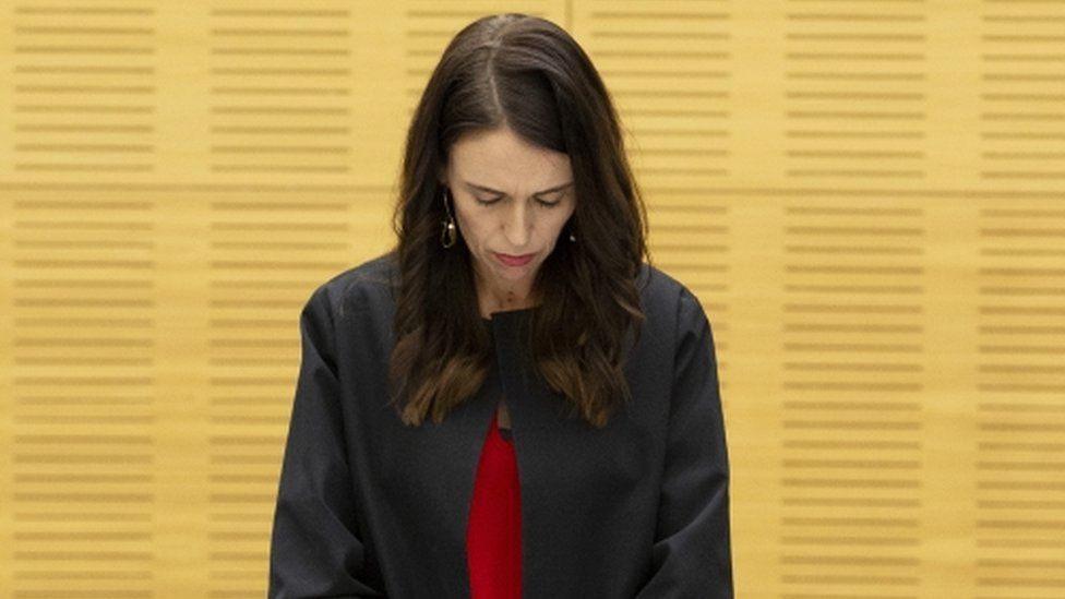 Prime Minister Jacinda Ardern observes a minute's silence during her cabinet meeting
