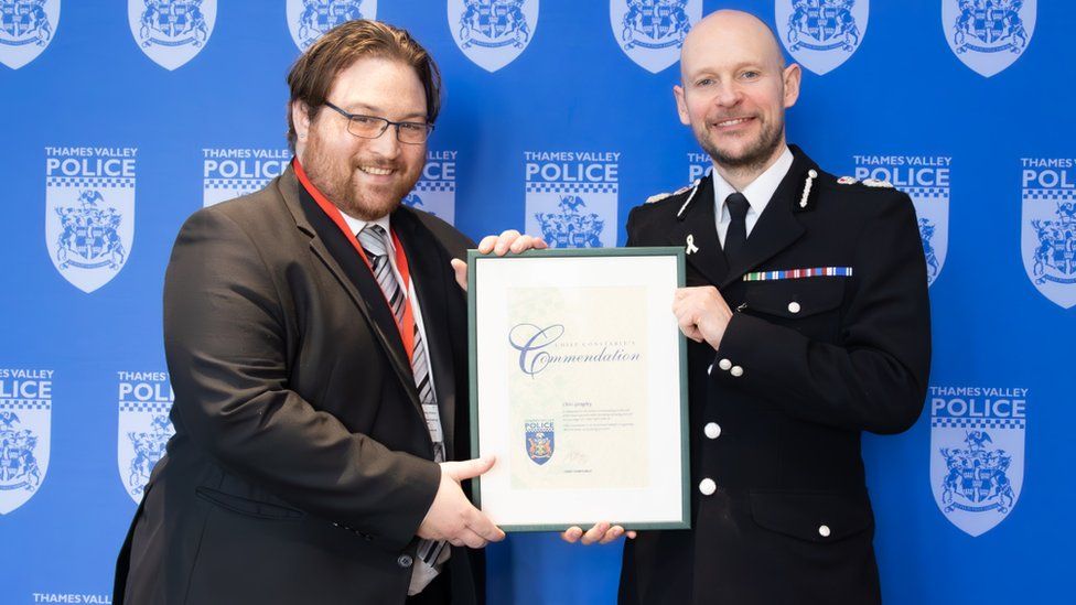 Chris Geraghty (left) is commended by Chief Constable Jason Hogg