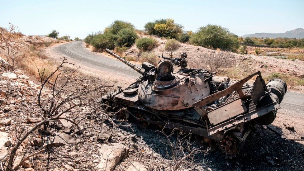 A damaged tank stands abandoned on a road near Humera, Ethiopia, on November 22, 2020.