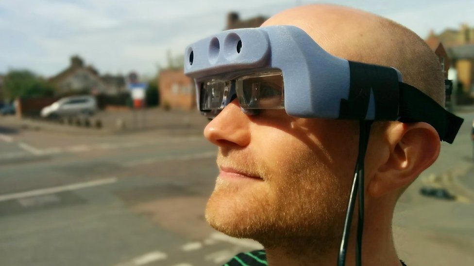 Man wearing prototype smart glass for the visually impaired