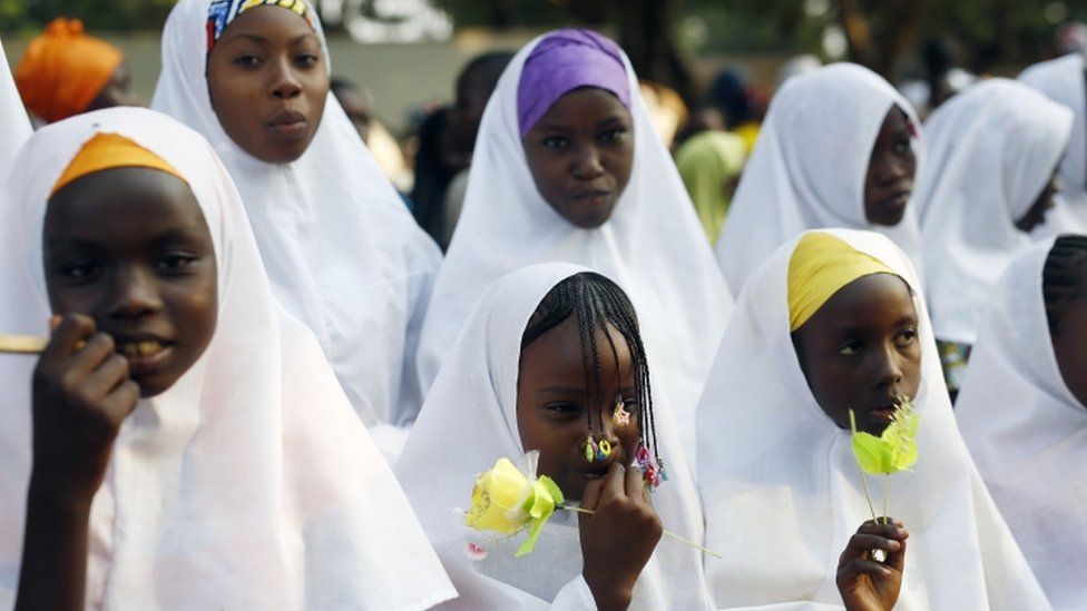 Children wait for the arrival of Pope Francis on the occasion of his visit at the Central Mosque in Bangui"s Muslim enclave of PK5, Central African Republic