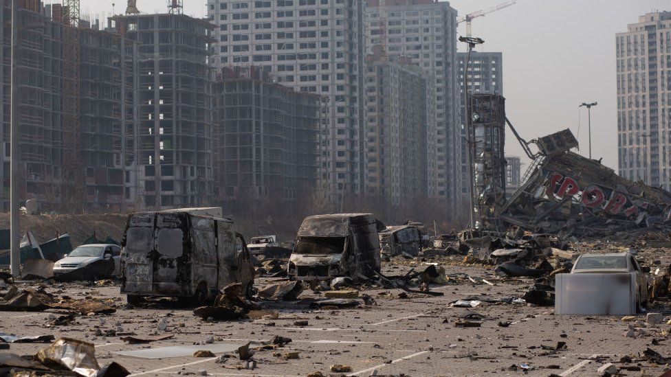 The site of a rocket explosion where a shopping mall used to be in Kyiv, Ukraine