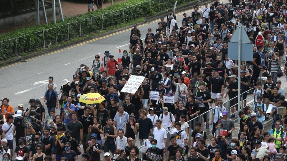 Protesters march during a rally in Hong Kong