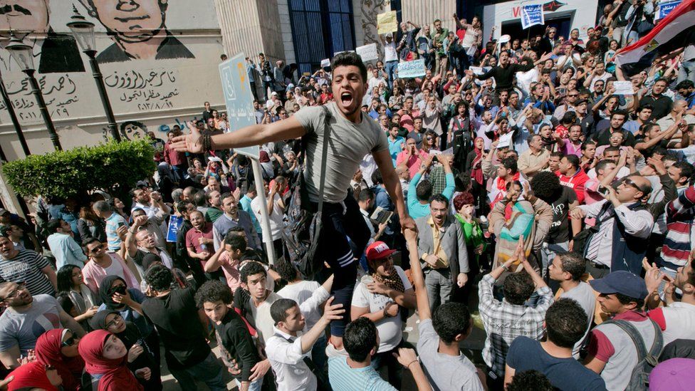 Egyptians shout slogans against Egyptian President Abdel-Fattah el-Sissi during a protest against the decision to hand over control of two strategic Red Sea islands to Saudi Arabia in front of the Press Syndicate, in Cairo, Egypt, Friday, April 15, 2016.