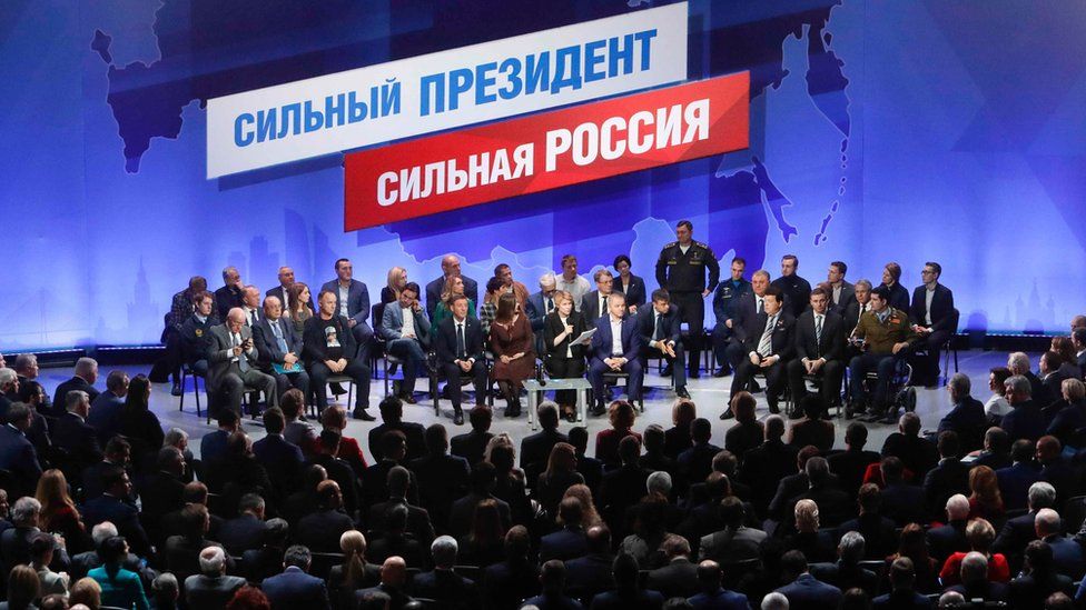 Members of the initiative group to nominate Vladimir Putin as a candidate in the 2018 presidential election attend a meeting in Moscow