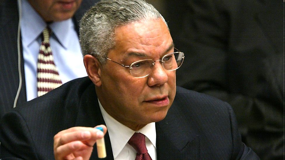 US Secretary of State Colin Powell addresses the UN in 2003, holding a vial of Anthrax which he claimed Iraq was producing.