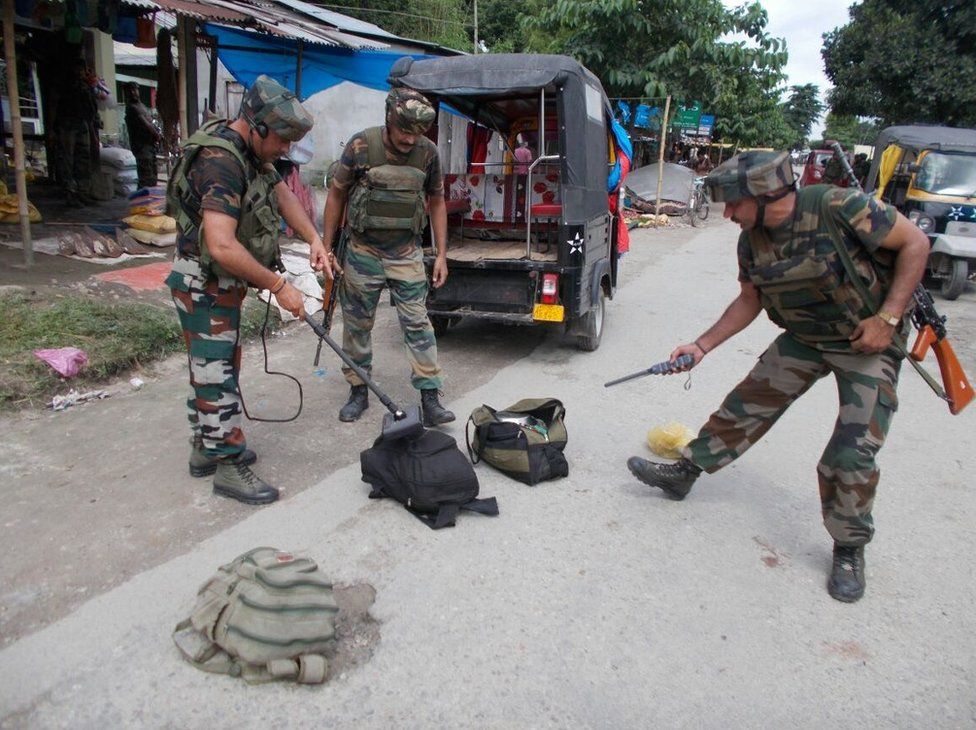 Security forces are searching the blast area in Kokrajhar