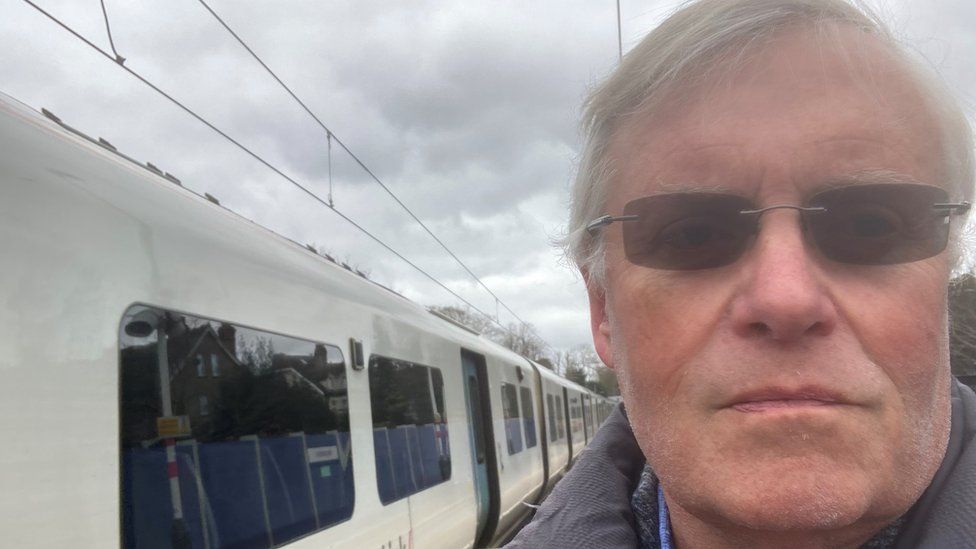 Neil Middleton by a train