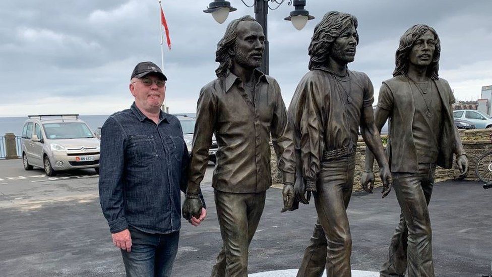 Andy Edwards and Bee Gees statue
