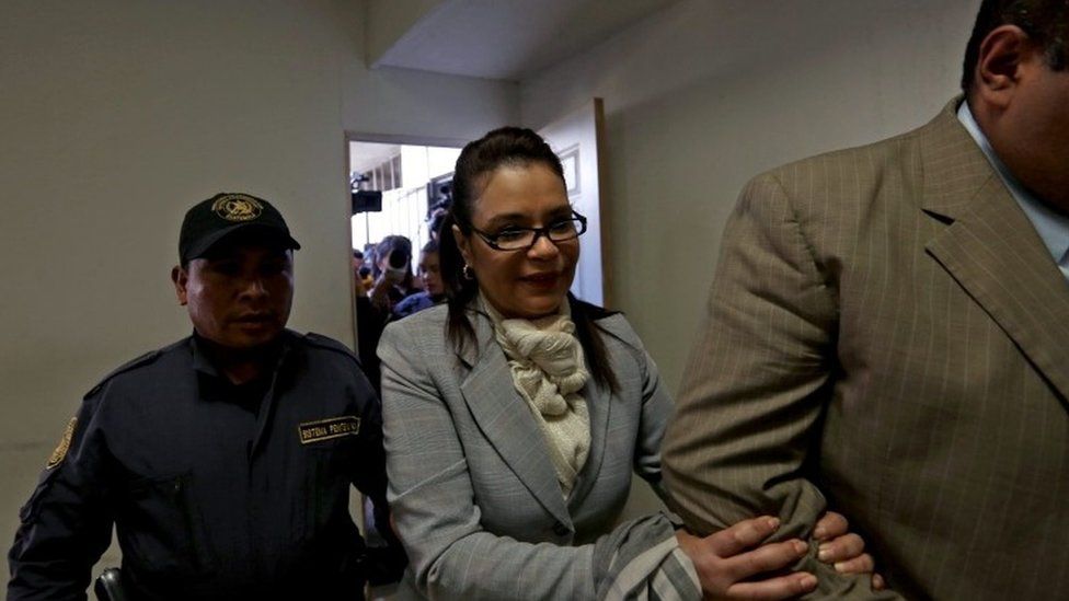 Former Guatemalan Vice President Roxana Baldetti (C) is escorted before a hearing in Villa Nueva, Guatemala, 10 March 2016.