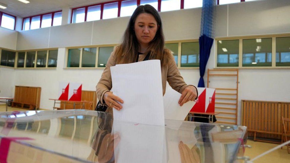 A voter in Warsaw