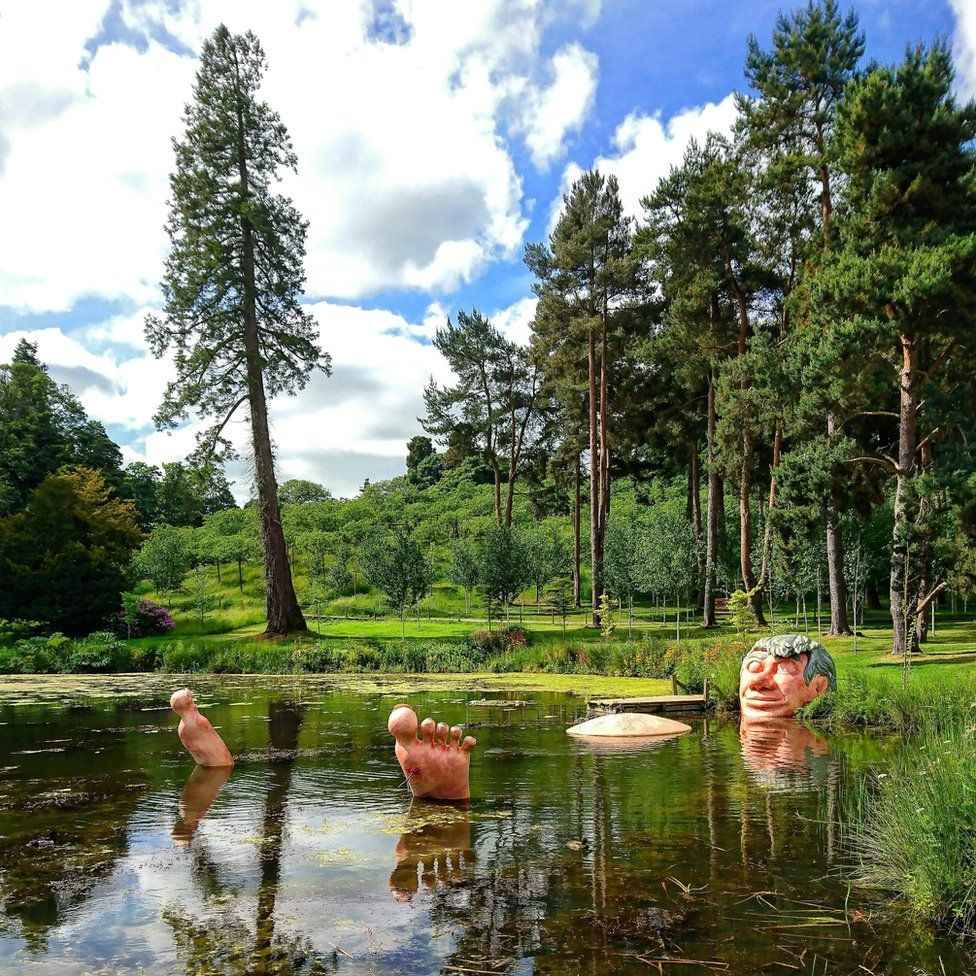 The giant sleeping in a lake at the Alnwick Garden in Northumberland