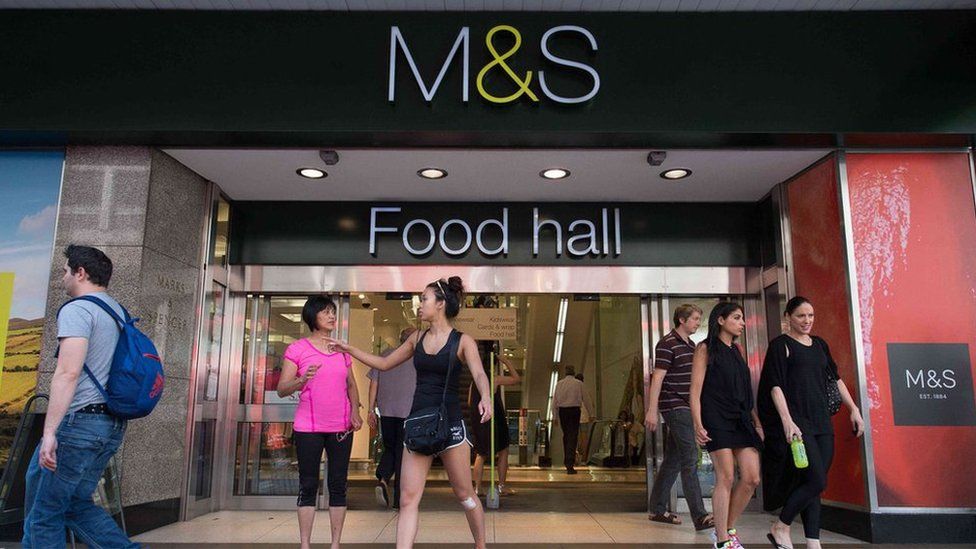 Shoppers at an M&S food hall
