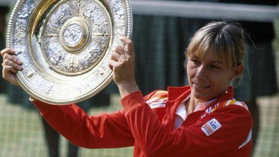 Martina Navratilova with her trophy for beating Chris Evert Lloyd to win the women's singles of the Wimbledon Lawn Tennis Championships 1982