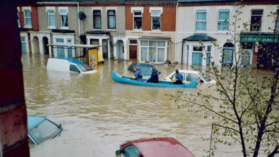 Canoe on a flooded street