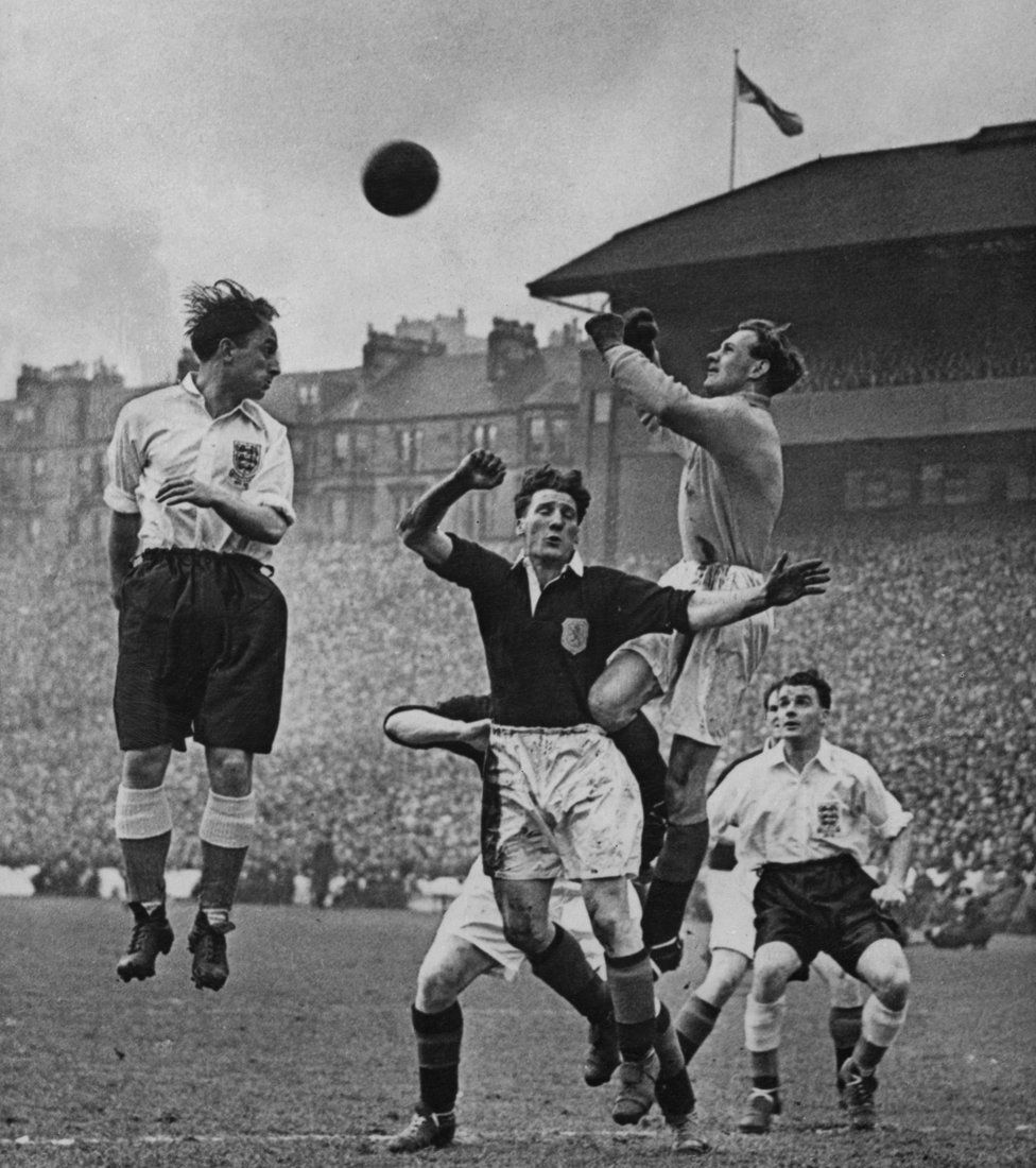 Ivor Broadis of England attempts to head the ball but is beaten to it by Bobby Brown, the Scotland goalkeeper, during the 195152 British Home Championship, an International match at Hampden Park, Glasgow, Scotland, 5th April 1952. England won 2-1.