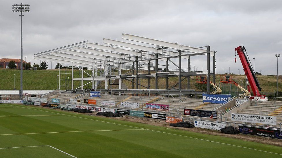 The East stand being built in 2014, with a crane visible to the right of the stand