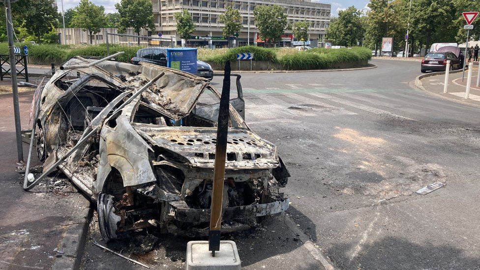 A burnt out car in Nanterre