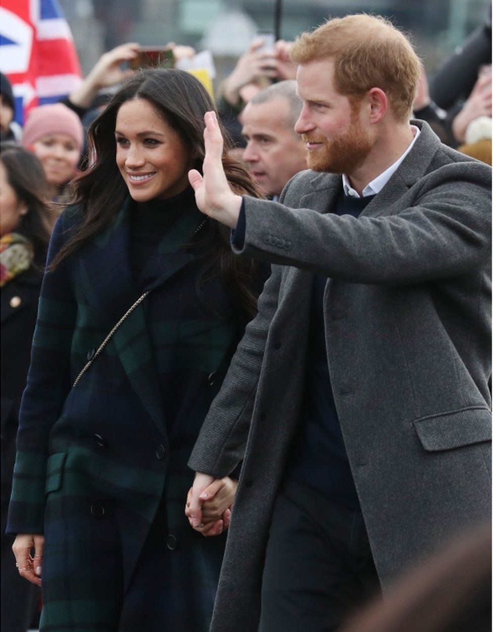 Prince Harry and Meghan Markle during a walkabout on the esplanade at Edinburgh Castle, during their visit to Scotland.
