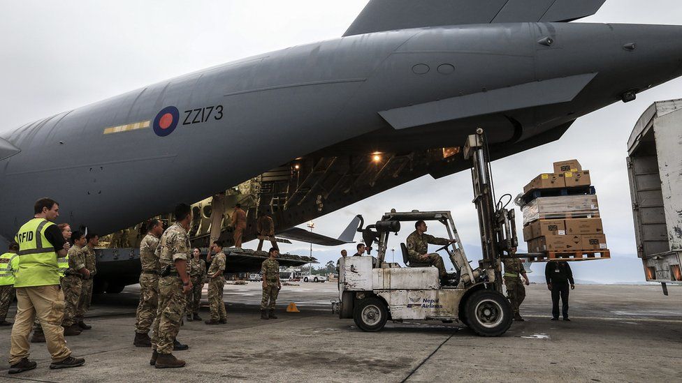 UK RAF plane being loaded with aid supplies
