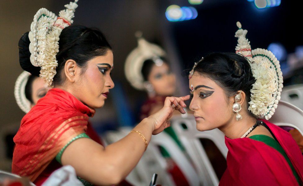 A group of colourful Odissi classical dancers from Kolkata, India do their final touch of make-up backstage before taking part on the two day Diwali (Festival of Lights) Hindu festival celebrations at the old Drive-Inn in Durban, on October 14, 2017. The two-day festival attracts over 100,000 visitors. The festival celebrations include, parading of floats, chariots, singing of devotional songs, dances, games, face painting, food stalls of vegetarian food, clothing, display of toys and jewellery. Young people also get the opportunity to showcase their cultural and spiritual talents