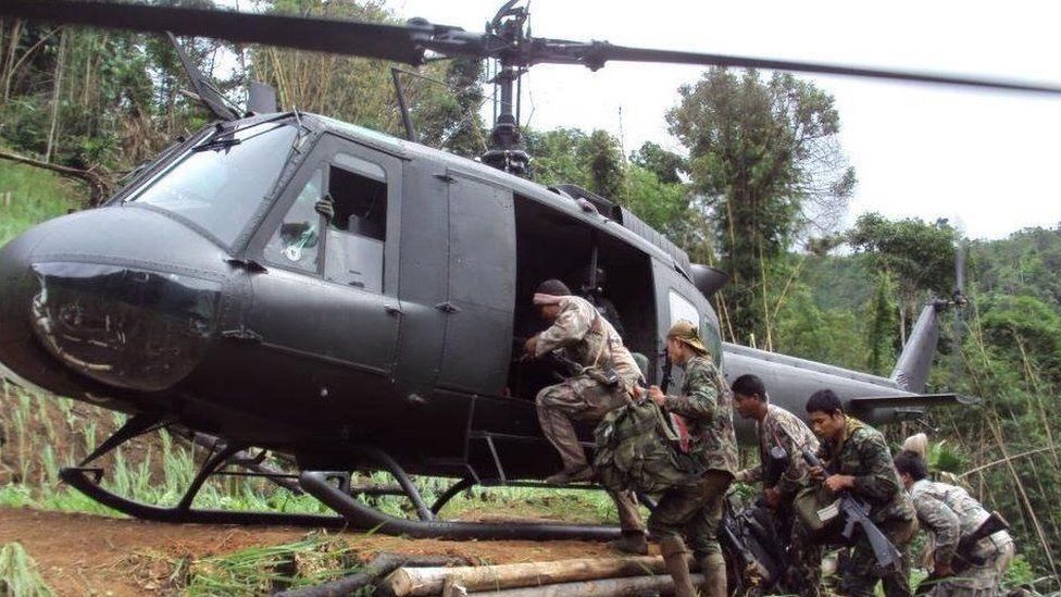 Soldiers board the helicopter