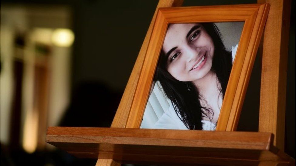 A portrait of Valeria Medel is seen during the wake in Ciudad Mendoza