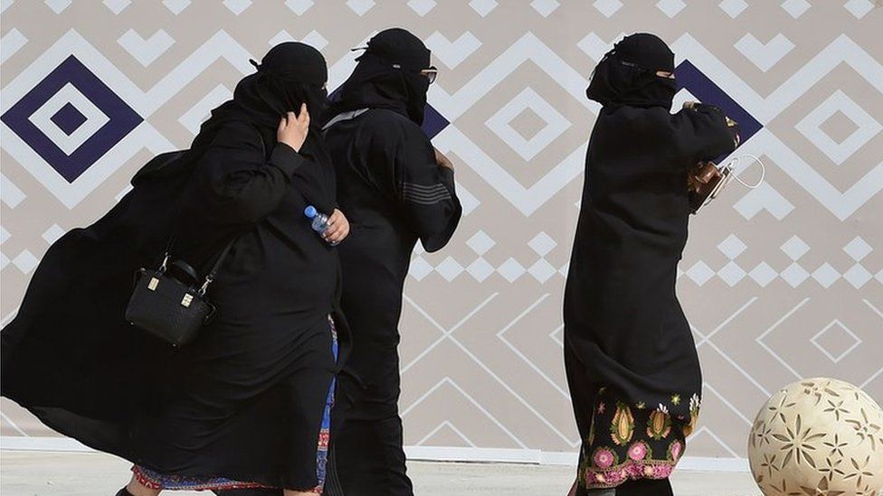 Saudi women wearing the abaya at a camel festival