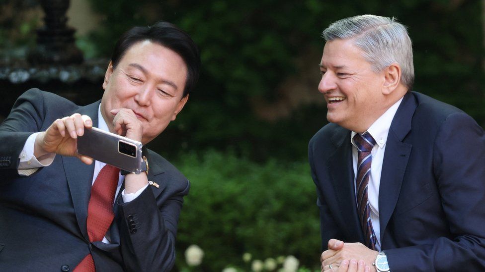 South Korean President Yoon Suk Yeol meets with Netflix co-CEO Ted Sarandos during a news conference in Washington.