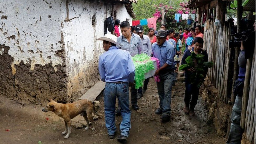 Relatives carry the coffin with the body of 2-1/2-year-old Guatemalan migrant Wilmer Josue Ramirez, who was detained last month at the U.S.-Mexico border but released from U.S. custody with his mother during treatment for an illness, toward the cemetery during his funeral in the village of Olopa, Guatemala May 26, 2019.