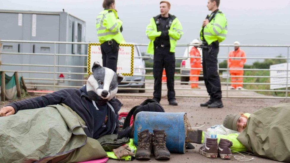 Protestors and police at HS2 construction site in Buckinghamshire.