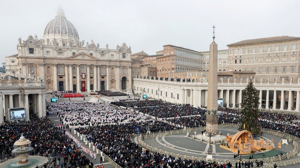 Large crowds gather in St Peter's Square at the Vatican