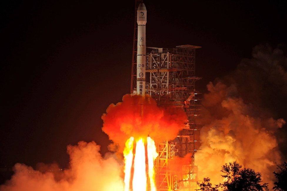 The Chang'e-3 rocket carrying the Jade Rabbit rover blasts off, from the Xichang Satellite Launch Center in the southwest province of Sichuan on December 2, 2013. China launched its first moon rover mission, state TV showed, the latest step in an ambitious space programme seen as a symbol of its rising global stature.