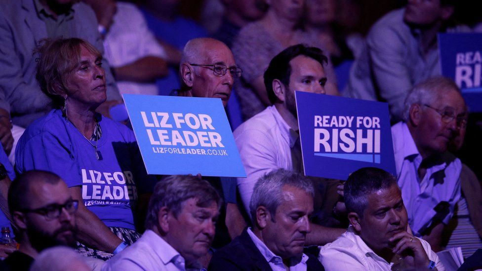 Supporters of Liz Truss and Rishi Sunak at a campaign hustings