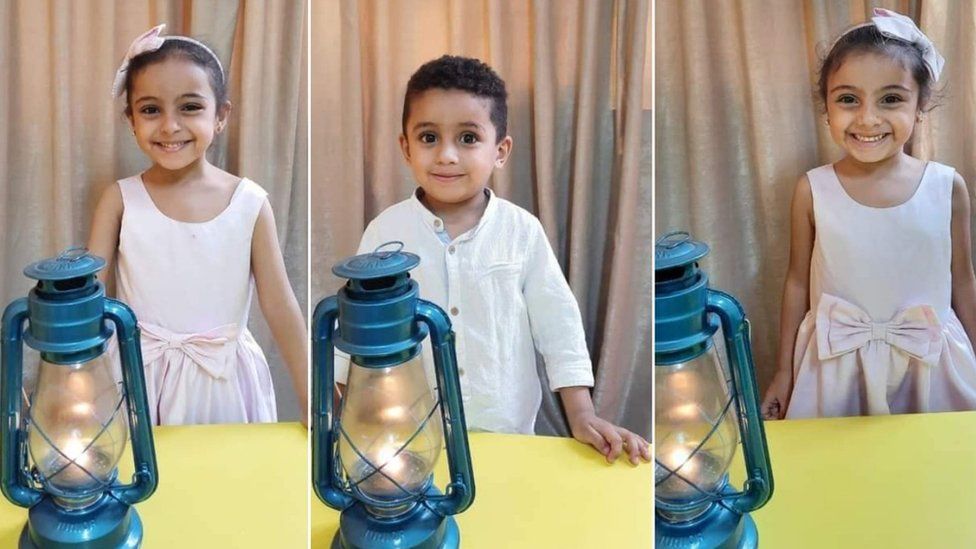 Family photo showing Five-year-old twins Mariam and Barsina Wajih and their three-year-old brother Ibrahim