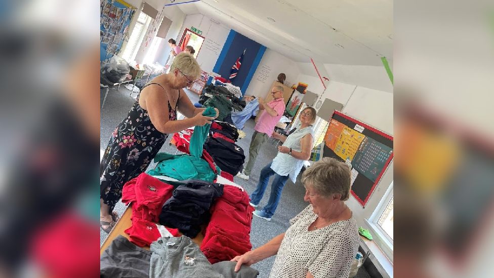 Volunteers at the Aberdare School Uniform Swap Shop