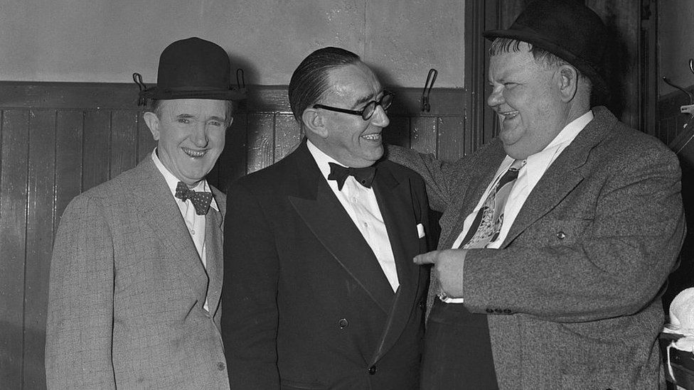 Stan Laurel and Oliver Hardy after an appearance during their tour of 1953