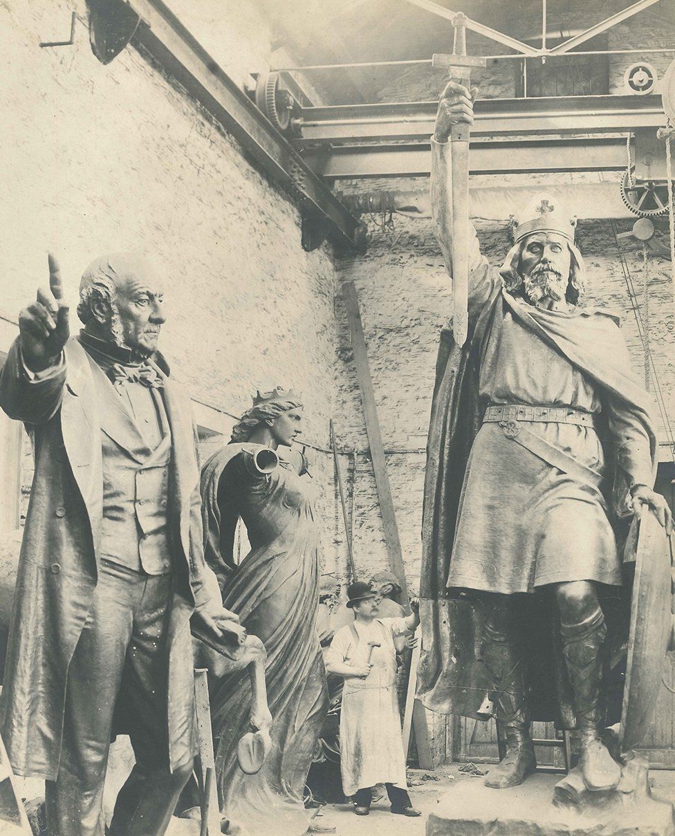John White works on the 20ft high statue of King Alfred