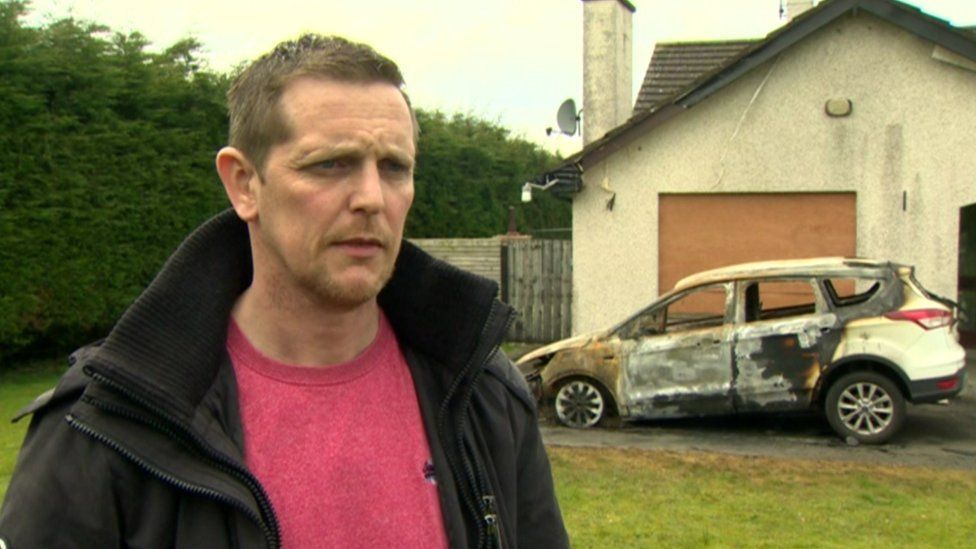 David Mooney and the burnt-out car