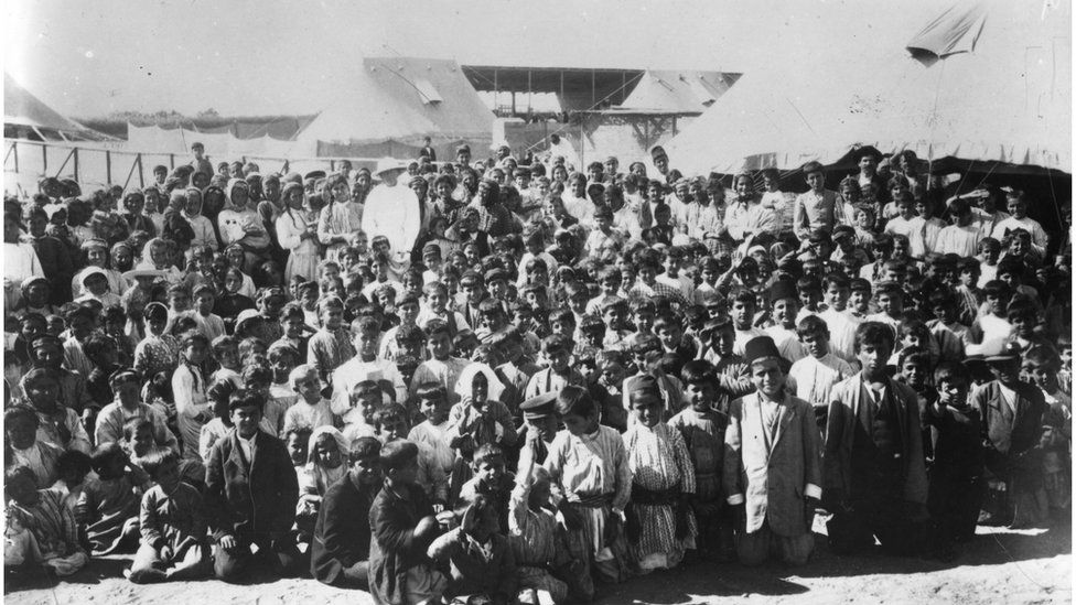 Circa 1915: Children of Armenian refugees in a refugee camp.