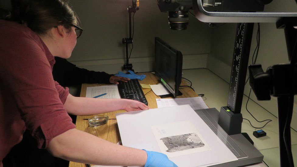 Digitising a page from one of Mercie Lack’s photograph albums
