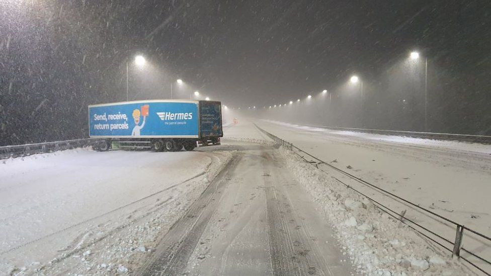 A lorry jack-knifed on the M62