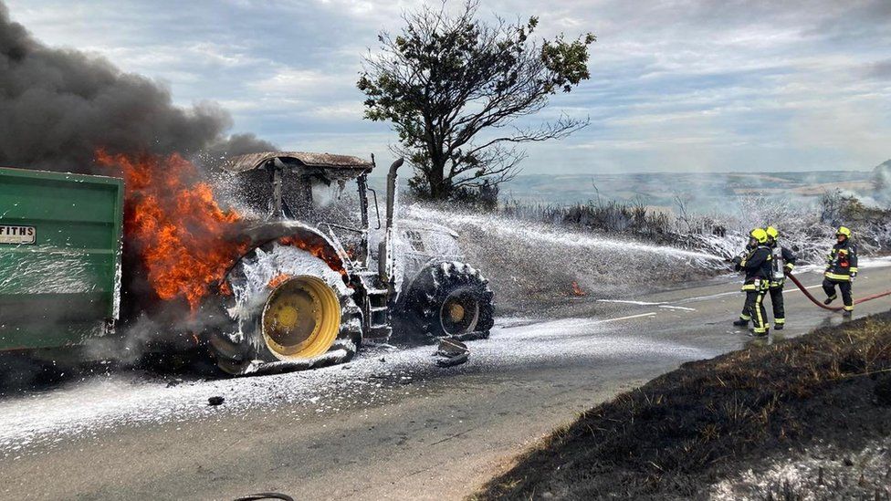 Tractor fire closes road in Devon BBC News