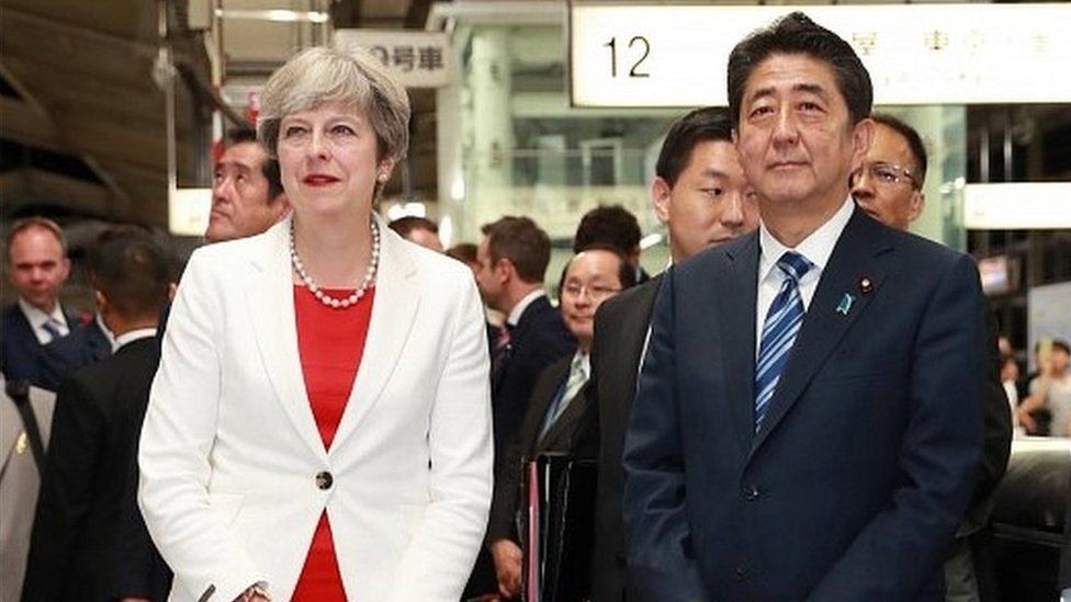 Theresa May and Japanese counterpart Shinzo Abe