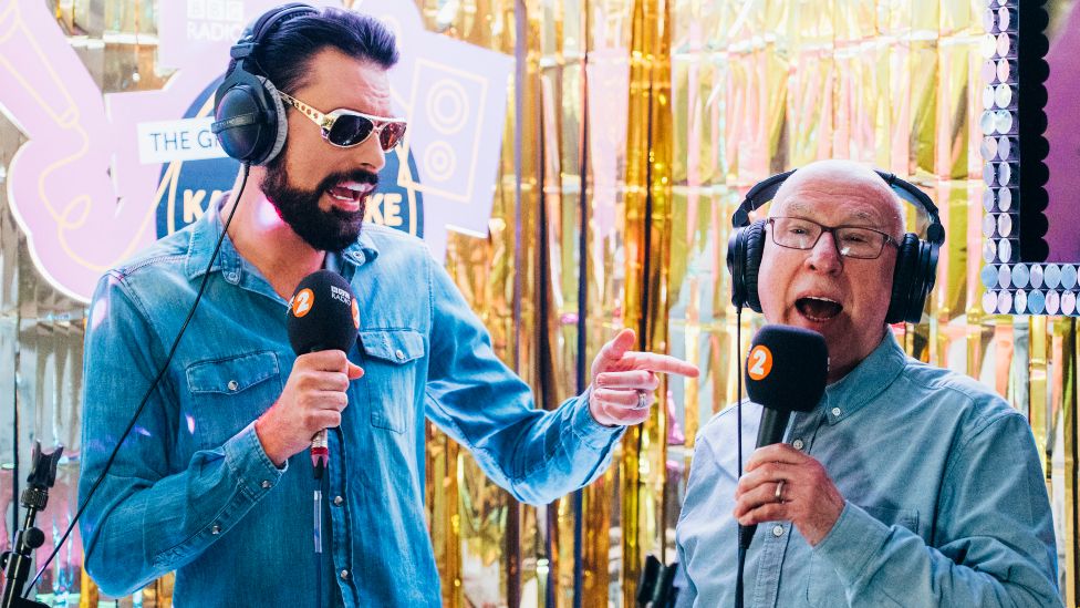 Rylan Clark and Ken Bruce in 2019 during Rylan's 24-hour Karaoke Challenge