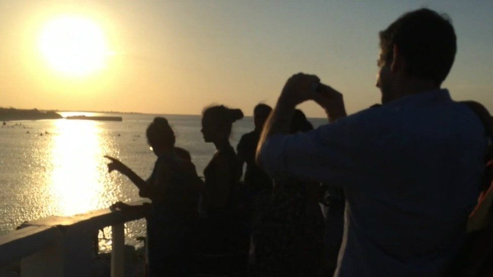 The BBC's Justin Rowlatt takes a moment to enjoy the sunset at the Sri Lankan military's seaside resort